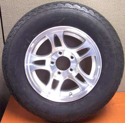 SPARE 14" TIRE AND ALUMINUM WHEEL